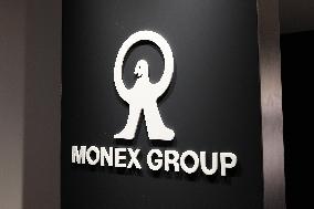 Monex Group's signage and logo